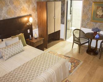 Hotel Dan Inn Araraquara by Nacional Inn - Araraquara - Ložnice