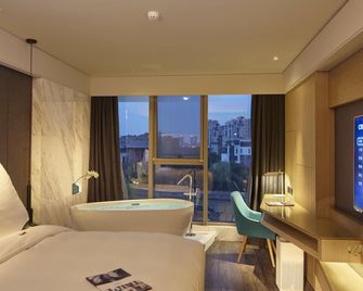 Mercure Yangzhou Dongguan Street - Yangzhou - Спальня