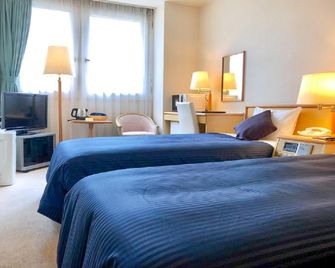 Hotel Livemax Budget Chitose - Chitose - Chambre