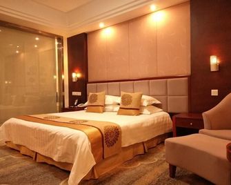 Jiuhuashan Center Hotel - Chizhou - Habitación