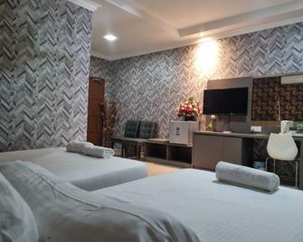 OYO 89849 Sekin Hotel & Resort - Куала Селангор - Спальня