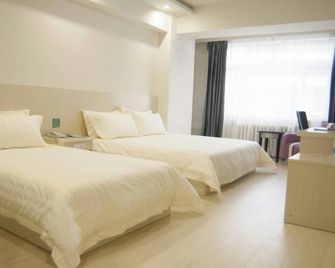 Jinjiang Inn Style Harbin Songhuajiang Bank Daxin Street - Harbin - Schlafzimmer