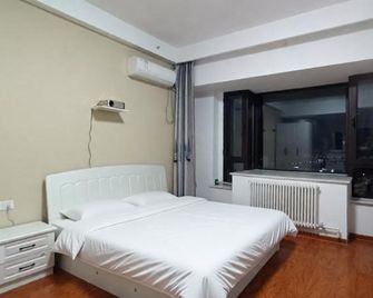 Dongchen Plaza Apartment - Langfang - Slaapkamer
