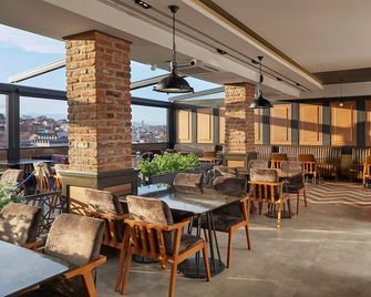 黃金酒  店 - 斯科普里 - 餐廳