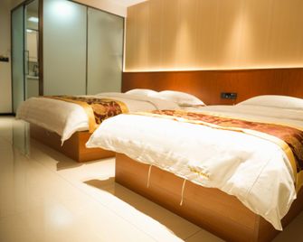 Yunqige Business Hotel (Wanda Branch) - Harbin - Bedroom