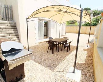 Apartment 2 adults 2 children. 7 min from the beaches and coves of Lloret de Mar - Vidreres - Patio