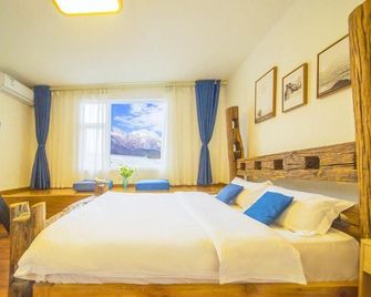Traveling Ji International Youth Hostel (Lijiang Ancient City) - 리장 - 침실