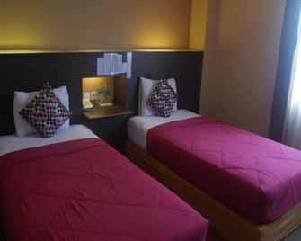 The Hotel - Samarinda - Ložnice