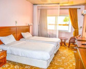 Rock Classic Hotel - Tororo - Habitación