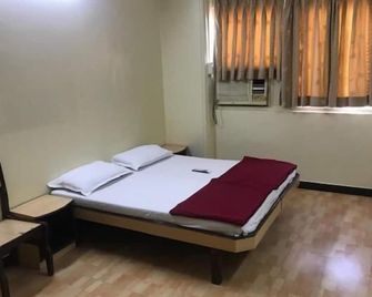 سانغام جيست هاوس - مومباي - غرفة نوم