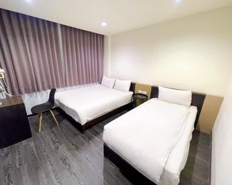 King Lin Hotel - Magong - Schlafzimmer