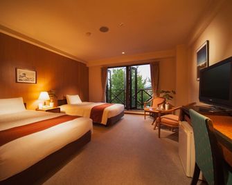 Hakuba Springs Hotel - האקובה - חדר שינה
