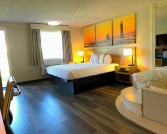 Days Inn & Suites by Wyndham Port Huron - Port Huron - Schlafzimmer