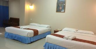 Hotel Kt Mutiara - קואלה טרנגאנו - חדר שינה