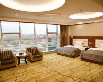 Zhong Yuan Hotel - Qujing - Bedroom