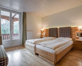 Hotel Alpensonne - Panoramazimmer & Restaurant - ארוזה - חדר שינה