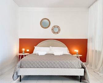 MareFiera Retreat - Bilocale per 2-4 persone - Rimini - Camera da letto