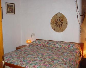 Appartamenti Le Primule - Golfo Aranci - Camera da letto