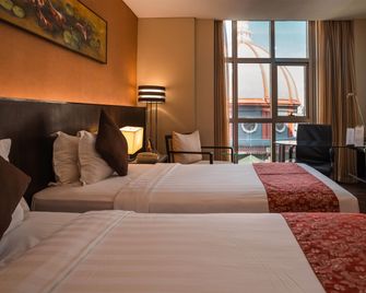 Ramada by Wyndham Manila Central - Manila - Habitación