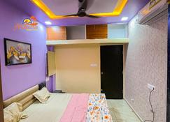 Atharva Home Stay - Kevadia - Bedroom