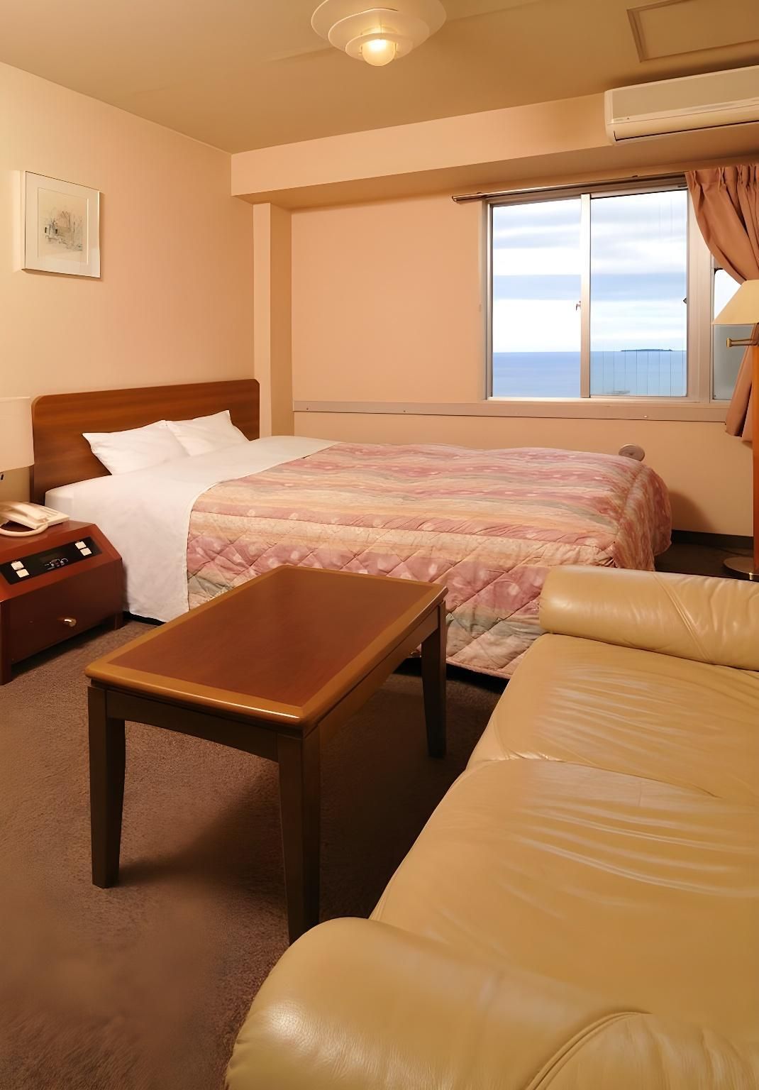 Fancy Business Hotel - אטאמי - חדר שינה