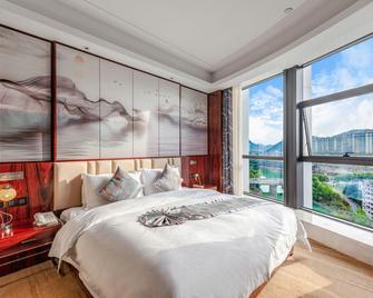 Tongren Zhusha Grand Hotel Fanjingshan Avenue Branch - Tongren - Habitación