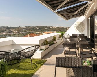 Penedo da Saudade Suites & Hostel - Coímbra - Balcón