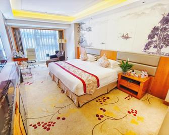 Haoyuan International Hotel - Yangquan - Спальня