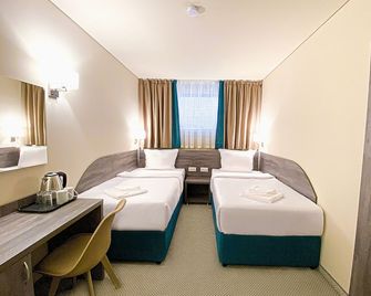 Terminal Park Motel - Bischofsheim - Спальня