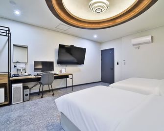 Hotel Lion - Cheongju - Camera da letto