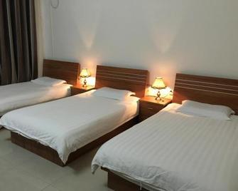 Hua Shan Xiang Yuan Hostel - Weinan - Habitación
