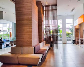 Simply Look Studio Tamansari Mahogany Karawang Apartment By Travelio - Karawang - Lobby