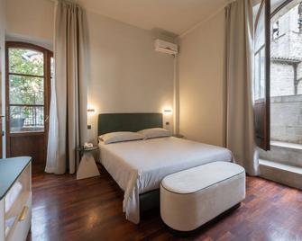 Hotel Gattapone - Gubbio - Makuuhuone