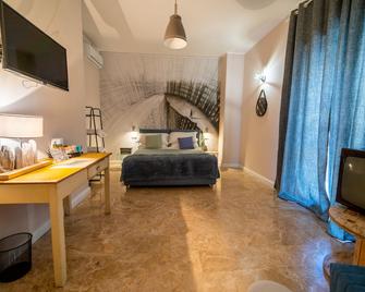 Urban Rooms - Tarento - Habitación