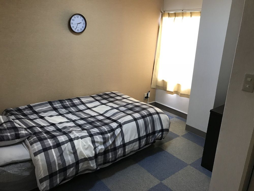 Hostel Paq Tokushima - טוקושימה - חדר שינה