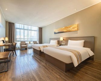 Ease Hotel Anshun Huangguoshu Avenue - Anshun - Habitación