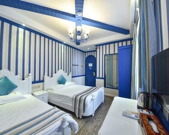 iG E-sports Homestay (Zengcuo'an) - Xiamen - Bedroom