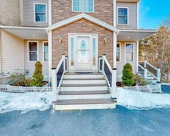 Stylish condo with a high-end kitchen, washer/dryer, & large yard - Westbrook - Building