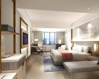 Greentree Eastern Binhu Road Wanda Hotel - Nanning - Schlafzimmer