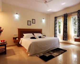 Radiant Resort - Bengaluru - Bedroom