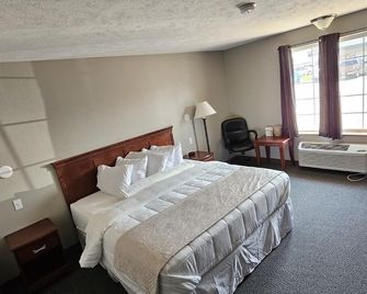 Travelodge by Wyndham Columbus NE - Columbus - Schlafzimmer