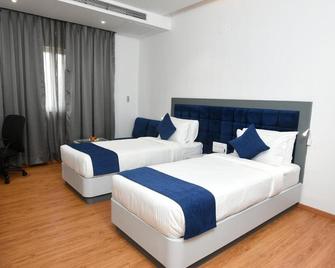 Kyriad Hotel Chinchwad - Pimpri - Chinchwad - Bedroom