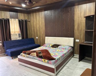 Hotel Divya - 瑞詩凱詩 - 臥室