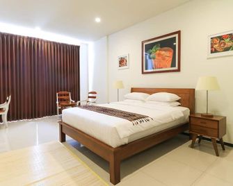 diAtas by Art Cafe Bumbu Bali - South Kuta - Habitación