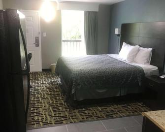Days Inn & Suites by Wyndham Collierville Germantown Area - Collierville - Habitación