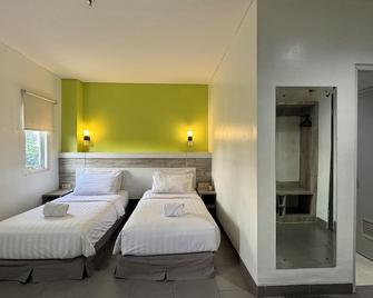 Izi Hotel - Bogor - Slaapkamer