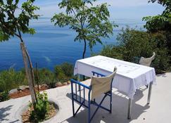 Holiday house Leonidhion for 1 - 4 persons with 1 bedroom - Holiday home - Tyros - Patio