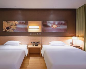 Iu Hotel Yulin Zhonggang Rt Mart - Yulin - Habitación