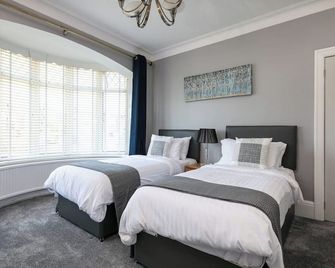 레스트 & 레차지 - 코이 하우스 - 채더턴 - 침실