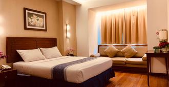 Grand Orchid Hotel - Surakarta City - Bedroom